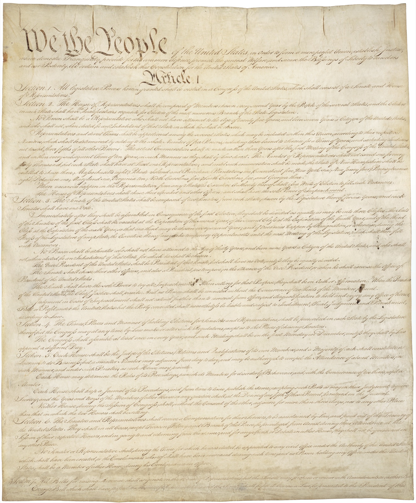 Archival first page of the United States Constitution
